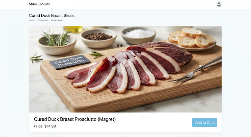 Cured duck breast prosciutto magret sliced revealing dark crimson meat and creamy white outer fat strip.